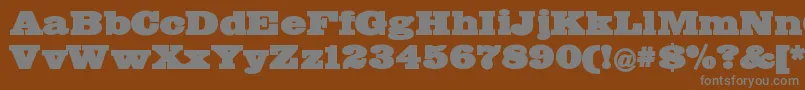 Bigmummy Font – Gray Fonts on Brown Background