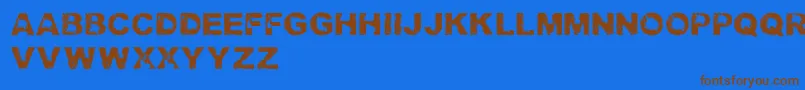 フォントTrashedlightRegular – 茶色の文字が青い背景にあります。