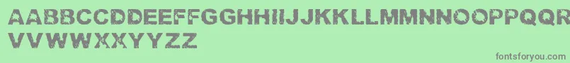 TrashedlightRegular Font – Gray Fonts on Green Background