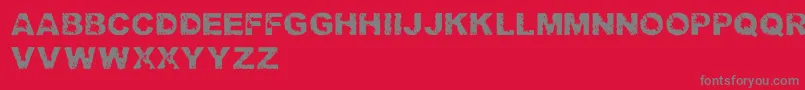 TrashedlightRegular Font – Gray Fonts on Red Background