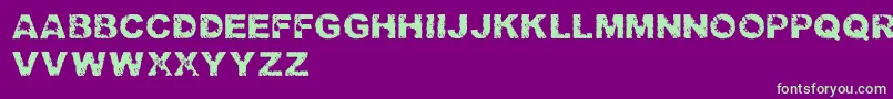 TrashedlightRegular Font – Green Fonts on Purple Background