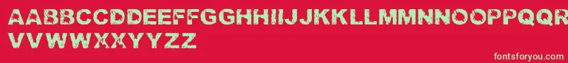 TrashedlightRegular Font – Green Fonts on Red Background