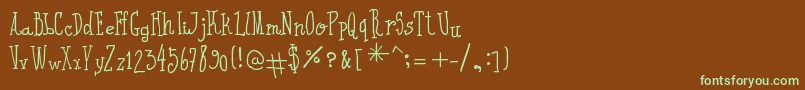 フォントIWroteAll – 緑色の文字が茶色の背景にあります。