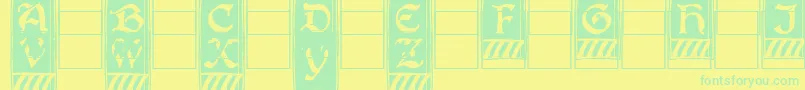 フォントBoistercapitals – 黄色い背景に緑の文字