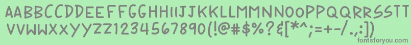 K26speechbubble Font – Gray Fonts on Green Background