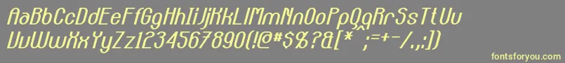 CarltonItalic-fontti – keltaiset fontit harmaalla taustalla