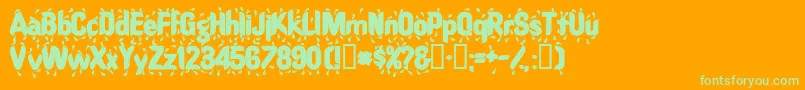 RaindancesskBold-Schriftart – Grüne Schriften auf orangefarbenem Hintergrund