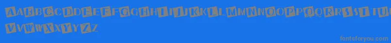 UkiahCaps Font – Gray Fonts on Blue Background