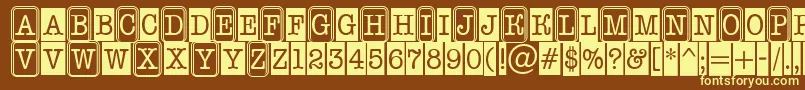 AOldtypernrcmcmb2-fontti – keltaiset fontit ruskealla taustalla