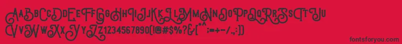 TriumphWheelsRough-Schriftart – Schwarze Schriften auf rotem Hintergrund
