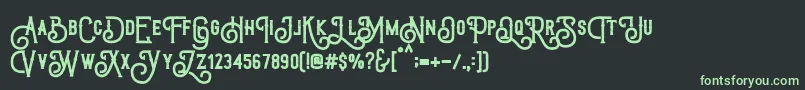 フォントTriumphWheelsRough – 黒い背景に緑の文字