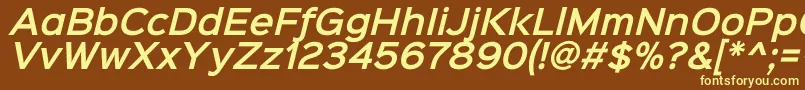 Sinkinsans600semibolditali-fontti – keltaiset fontit ruskealla taustalla