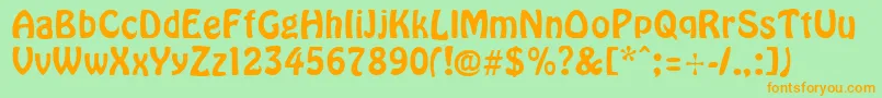 フォントCyrillichover – オレンジの文字が緑の背景にあります。
