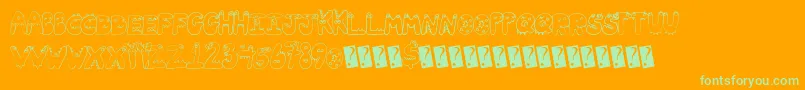 Tinyfriends-Schriftart – Grüne Schriften auf orangefarbenem Hintergrund