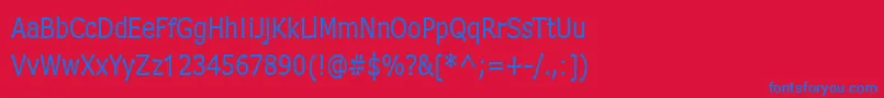 DrummonNarrow-Schriftart – Blaue Schriften auf rotem Hintergrund