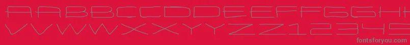 フォントEneasexpandedRegular – 赤い背景に灰色の文字