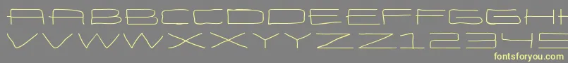 EneasexpandedRegular Font – Yellow Fonts on Gray Background