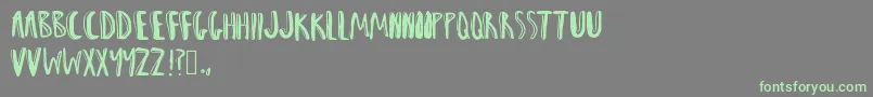Woah Font – Green Fonts on Gray Background