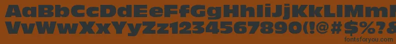 AntiqueolivestdNord-fontti – mustat fontit ruskealla taustalla