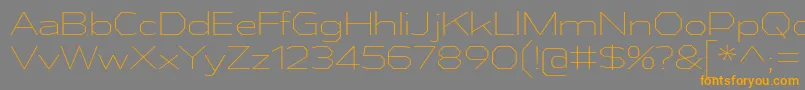 AthabascaExEl Font – Orange Fonts on Gray Background