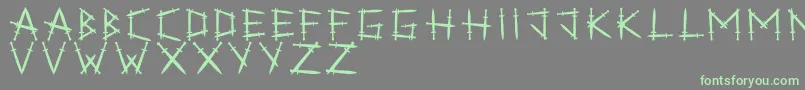 Swordlings Font – Green Fonts on Gray Background