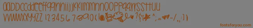 Mileytwerk Font – Brown Fonts on Gray Background