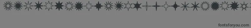 StarsSplatsArrows Font – Black Fonts on Gray Background