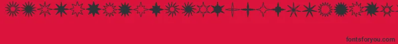 StarsSplatsArrows Font – Black Fonts on Red Background