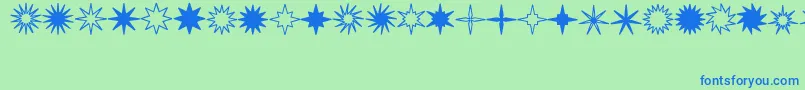 StarsSplatsArrows Font – Blue Fonts on Green Background