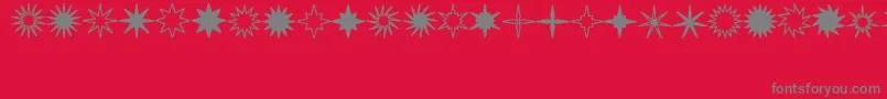 StarsSplatsArrows Font – Gray Fonts on Red Background