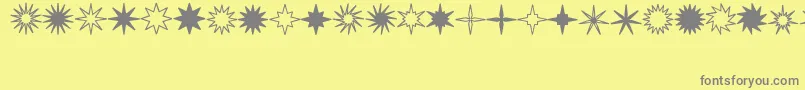 Weitere Informationen zur StarsSplatsArrows-Schriftart StarsSplatsArrows-Schriftart – Graue Schriften auf gelbem Hintergrund