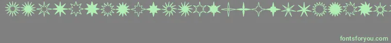 StarsSplatsArrows Font – Green Fonts on Gray Background