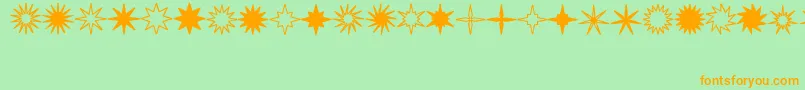 StarsSplatsArrows-Schriftart – Orangefarbene Schriften auf grünem Hintergrund