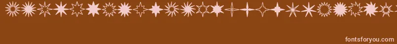 fuente StarsSplatsArrows – Fuentes Rosadas Sobre Fondo Marrón