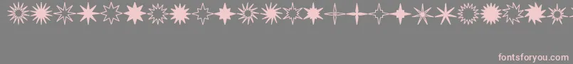 StarsSplatsArrows Font – Pink Fonts on Gray Background
