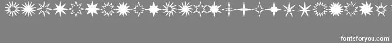 StarsSplatsArrows Font – White Fonts on Gray Background