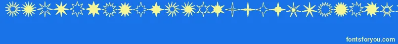 StarsSplatsArrows Font – Yellow Fonts on Blue Background