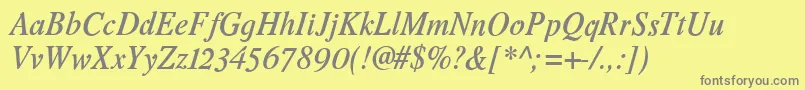 Romandeadfno2stdDemibolditalic-fontti – harmaat kirjasimet keltaisella taustalla