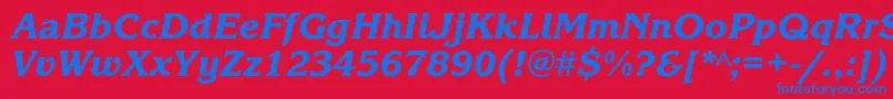KorinnablackcItalic-Schriftart – Blaue Schriften auf rotem Hintergrund