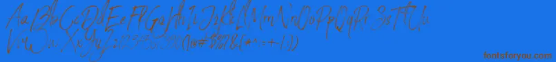 StronglovesFree-Schriftart – Braune Schriften auf blauem Hintergrund