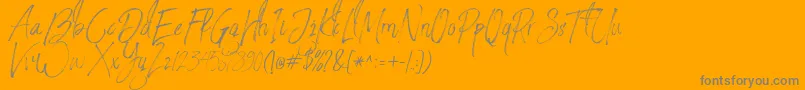 StronglovesFree-Schriftart – Graue Schriften auf orangefarbenem Hintergrund