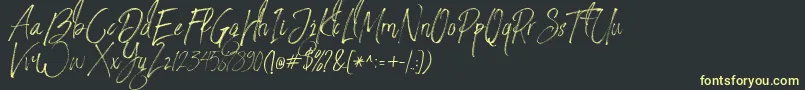 フォントStronglovesFree – 黒い背景に黄色の文字