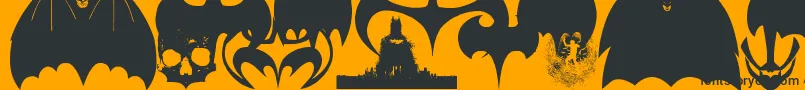 Fonte BatmanEvolutionLogoFontG – fontes pretas em um fundo laranja