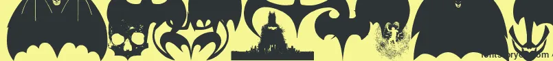 Шрифт BatmanEvolutionLogoFontG – чёрные шрифты на жёлтом фоне