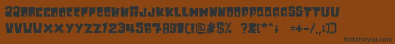 フォントInkybear – 黒い文字が茶色の背景にあります