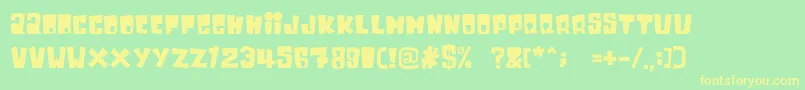 フォントInkybear – 黄色の文字が緑の背景にあります