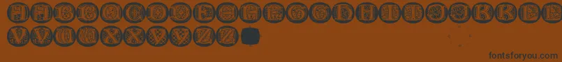 LombardicapsRound Font – Black Fonts on Brown Background