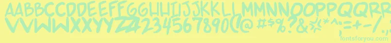 Sp Font – Green Fonts on Yellow Background