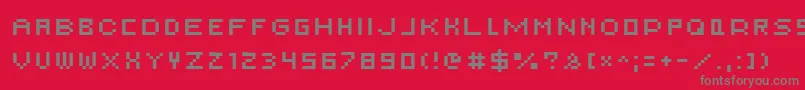 AuxDotbitcSmallcaps Font – Gray Fonts on Red Background