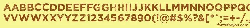 Шрифт Wickedgrit – коричневые шрифты на жёлтом фоне